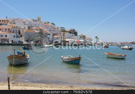 To use this stock image in your creative project, please select the size you need over to the right and click the "Add to Cart" button.
Your downloaded image will come with the Cutcaster watermark removed so don’t worry about the watermark you see on this page. Ferragudo, Village of Algarve. stock photo, Ferragudo, Village of Algarve, Portugal. by Inacio Pires
