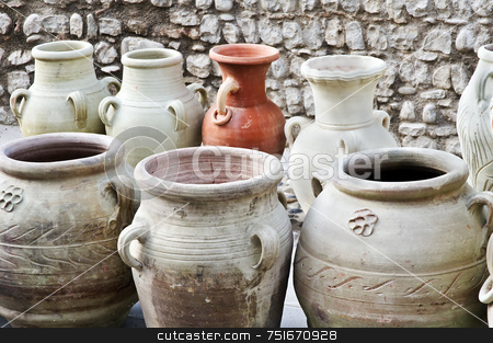 To use this stock image in your creative project, please select the size you need over to the right and click the "Add to Cart" button.
Your downloaded image will come with the Cutcaster watermark removed so don’t worry about the watermark you see on this page. Vases and amphoras stock photo, Different kind of terracotta containers displayed in a street market by Massimiliano Leban