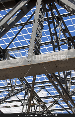 To use this stock image in your creative project, please select the size you need over to the right and click the "Add to Cart" button.
Your downloaded image will come with the Cutcaster watermark removed so don’t worry about the watermark you see on this page. Steel framework stock photo, Detail of steel structure of a roof against a blue sky by Massimiliano Leban