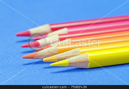 To use this stock image in your creative project, please select the size you need over to the right and click the "Add to Cart" button.
Your downloaded image will come with the Cutcaster watermark removed so don’t worry about the watermark you see on this page. Coloured pencils stock photo, Yellow to red pencils macro on blue by Massimiliano Leban
