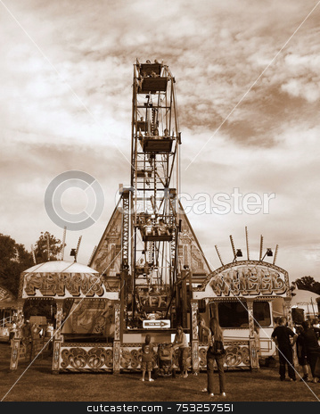 To use this stock image in your creative project, please select the size you need over to the right and click the "Add to Cart" button.
Your downloaded image will come with the Cutcaster watermark removed so don’t worry about the watermark you see on this page. Ferris Wheel stock photo, A ferris wheel in a fair ground. by Lucy Clark