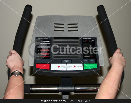 To use this stock image in your creative project, please select the size you need over to the right and click the "Add to Cart" button.
Your downloaded image will come with the Cutcaster watermark removed so don’t worry about the watermark you see on this page. Exercise Bike stock photo, Working out on an exercise bike by Lucy Clark