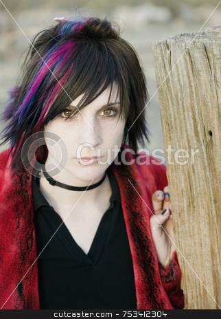 To use this stock image in your creative project, please select the size you need over to the right and click the "Add to Cart" button.
Your downloaded image will come with the Cutcaster watermark removed so don’t worry about the watermark you see on this page. Young Girl stock photo, Young Girl with A Magenta Streak in her Hair by Scott Griessel