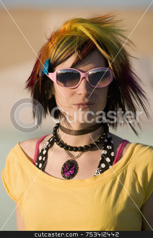 To use this stock image in your creative project, please select the size you need over to the right and click the "Add to Cart" button.
Your downloaded image will come with the Cutcaster watermark removed so don’t worry about the watermark you see on this page. Punk Girl with Bright Colorful and Big Sunglasses stock photo, Portrait of a Punk Girl with Bright Colorful and Big Sunglasses Outdoors at Sundown by Scott Griessel