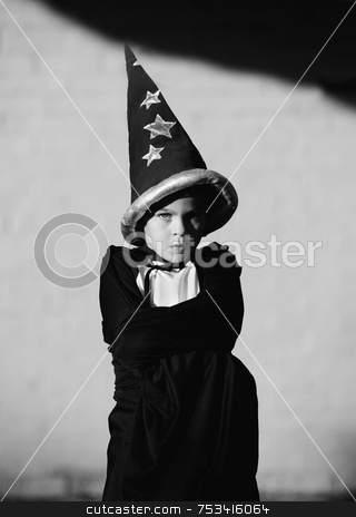 To use this stock image in your creative project, please select the size you need over to the right and click the "Add to Cart" button.
Your downloaded image will come with the Cutcaster watermark removed so don’t worry about the watermark you see on this page. Boy Wizard stock photo, Youn boy with a wizard and his arms crossed by Scott Griessel