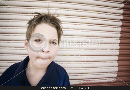 To use this stock image in your creative project, please select the size you need over to the right and click the "Add to Cart" button.
Your downloaded image will come with the Cutcaster watermark removed so don’t worry about the watermark you see on this page. Boy Making A Curious Face stock photo, Young Boy with Looking Curious and Pursing His Lips by Scott Griessel