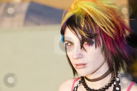To use this stock image in your creative project, please select the size you need over to the right and click the "Add to Cart" button.
Your downloaded image will come with the Cutcaster watermark removed so don’t worry about the watermark you see on this page. Young Punk Woman stock photo, Close-up of a colorful young punk woman by Scott Griessel
