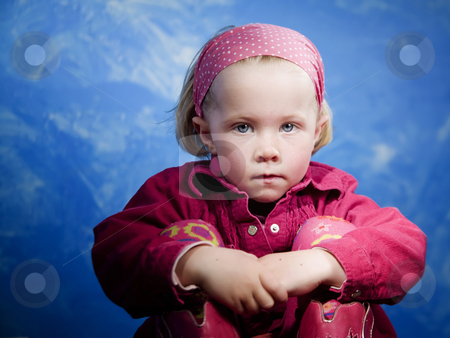 To use this stock image in your creative project, please select the size you need over to the right and click the "Add to Cart" button.
Your downloaded image will come with the Cutcaster watermark removed so don’t worry about the watermark you see on this page. Little girl in front of blue stock photo, Little girl in studio in front of a blue wall by Scott Griessel