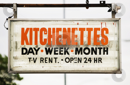 To use this stock image in your creative project, please select the size you need over to the right and click the "Add to Cart" button.
Your downloaded image will come with the Cutcaster watermark removed so don’t worry about the watermark you see on this page. Motel Sign stock photo, Motel sign advertising rooms with kitchenettes. by Scott Griessel