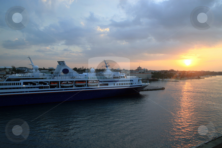 To use this stock image in your creative project, please select the size you need over to the right and click the "Add to Cart" button.
Your downloaded image will come with the Cutcaster watermark removed so don’t worry about the watermark you see on this page. Cruise Ship Sunset stock photo, Cruise Ship at sunset in the Bahamas by Lucy Clark