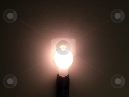 To use this stock image in your creative project, please select the size you need over to the right and click the "Add to Cart" button.
Your downloaded image will come with the Cutcaster watermark removed so don’t worry about the watermark you see on this page. Lit Bulb stock photo, A bulb is lit and surrounded by the darkness by Rebecca Mosoetsa