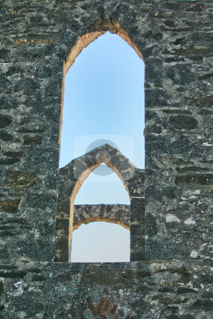To use this stock image in your creative project, please select the size you need over to the right and click the "Add to Cart" button.
Your downloaded image will come with the Cutcaster watermark removed so don’t worry about the watermark you see on this page. Arched Window stock photo, An old historic arched window with blue sky background by Kevin Tietz