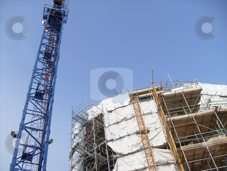 To use this stock image in your creative project, please select the size you need over to the right and click the "Add to Cart" button.
Your downloaded image will come with the Cutcaster watermark removed so don’t worry about the watermark you see on this page. Overview of building site stock photo, Overview of building site as construction taking place with crane. by Martin Crowdy