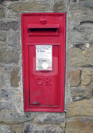 To use this stock image in your creative project, please select the size you need over to the right and click the "Add to Cart" button.
Your downloaded image will come with the Cutcaster watermark removed so don’t worry about the watermark you see on this page. Red British post box stock photo, Red British post box on wall in rural setting. by Martin Crowdy