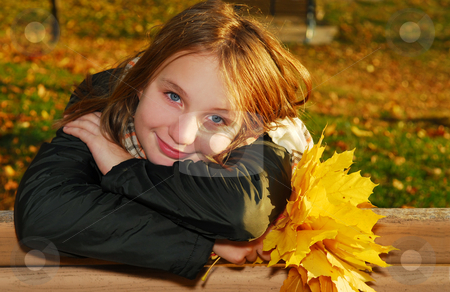 To use this stock image in your creative project, please select the size you need over to the right and click the "Add to Cart" button.
Your downloaded image will come with the Cutcaster watermark removed so don’t worry about the watermark you see on this page. Girl with autumn leaves stock photo, Portrait of a beautiful teenage girl with yellow fall maple leaves by Elena Elisseeva