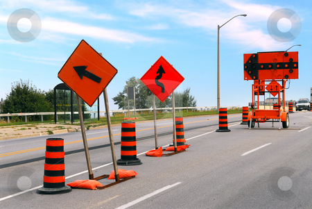 To use this stock image in your creative project, please select the size you need over to the right and click the "Add to Cart" button.
Your downloaded image will come with the Cutcaster watermark removed so don’t worry about the watermark you see on this page. Road construction stock photo, Road construction signs and cones on a city street by Elena Elisseeva