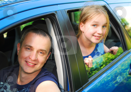 To use this stock image in your creative project, please select the size you need over to the right and click the "Add to Cart" button.
Your downloaded image will come with the Cutcaster watermark removed so don’t worry about the watermark you see on this page. Family trip stock photo, Father and daughter sitting inside the car ready to go on family trip by Elena Elisseeva