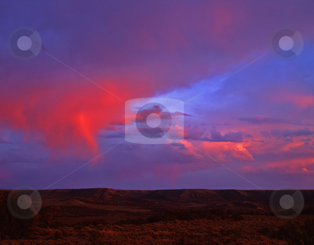 To use this stock image in your creative project, please select the size you need over to the right and click the "Add to Cart" button.
Your downloaded image will come with the Cutcaster watermark removed so don’t worry about the watermark you see on this page. Flaming Gorge Sunset stock photo, Sunset at the Flaming Gorge National Recreation Area, Wyoming. by Mike Norton