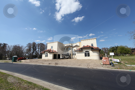 To use this stock image in your creative project, please select the size you need over to the right and click the "Add to Cart" button.
Your downloaded image will come with the Cutcaster watermark removed so don’t worry about the watermark you see on this page. House Construction stock photo, A Large House in Construction in Florida by Lucy Clark