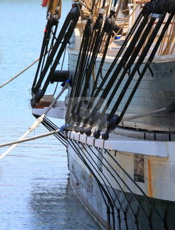 To use this stock image in your creative project, please select the size you need over to the right and click the "Add to Cart" button.
Your downloaded image will come with the Cutcaster watermark removed so don’t worry about the watermark you see on this page. Rigging stock photo, rigging of a sail boat with the blue water in the background by Henrik Lehnerer