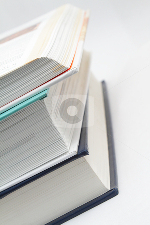 To use this stock image in your creative project, please select the size you need over to the right and click the "Add to Cart" button.
Your downloaded image will come with the Cutcaster watermark removed so don’t worry about the watermark you see on this page. Stack of books stock photo, Photo of a stack of three books by Olena Pupirina