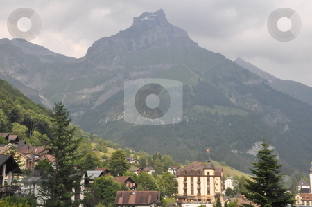 To use this stock image in your creative project, please select the size you need over to the right and click the "Add to Cart" button.
Your downloaded image will come with the Cutcaster watermark removed so don’t worry about the watermark you see on this page. Engelberg in Switzerland stock photo, Engelberg in the Alps in Switzerland by Ritu Jethani