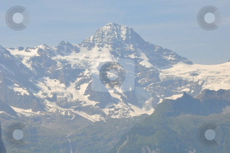To use this stock image in your creative project, please select the size you need over to the right and click the "Add to Cart" button.
Your downloaded image will come with the Cutcaster watermark removed so don’t worry about the watermark you see on this page. Jungfrau in Switzerland stock photo, Jungfrau in Switzerland, Europe by Ritu Jethani