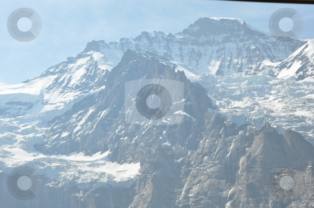 To use this stock image in your creative project, please select the size you need over to the right and click the "Add to Cart" button.
Your downloaded image will come with the Cutcaster watermark removed so don’t worry about the watermark you see on this page. Jungfrau in Switzerland stock photo, Jungfrau in Switzerland, Europe by Ritu Jethani
