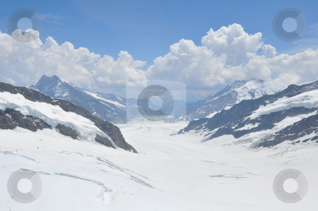To use this stock image in your creative project, please select the size you need over to the right and click the "Add to Cart" button.
Your downloaded image will come with the Cutcaster watermark removed so don’t worry about the watermark you see on this page. Jungfrau in Switzerland stock photo, Jungfrau in Switzerland, Europe by Ritu Jethani