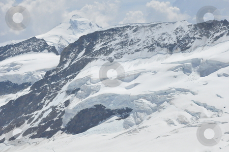To use this stock image in your creative project, please select the size you need over to the right and click the "Add to Cart" button.
Your downloaded image will come with the Cutcaster watermark removed so don’t worry about the watermark you see on this page. Jungfrau in Switzerland stock photo, Jungfrau in Switzerland, Europe by Ritu Jethani