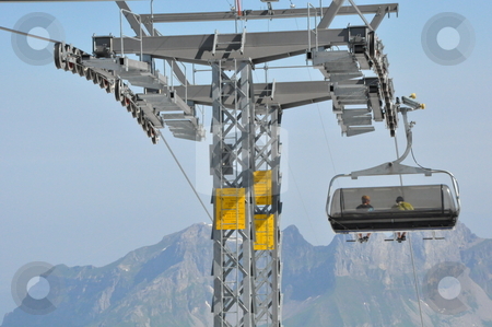 To use this stock image in your creative project, please select the size you need over to the right and click the "Add to Cart" button.
Your downloaded image will come with the Cutcaster watermark removed so don’t worry about the watermark you see on this page. Chairlifts at Mount Titlis stock photo, Chairlifts at Mount Titlis, Switzerland by Ritu Jethani