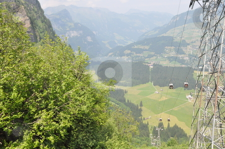 To use this stock image in your creative project, please select the size you need over to the right and click the "Add to Cart" button.
Your downloaded image will come with the Cutcaster watermark removed so don’t worry about the watermark you see on this page. Cable Cars at Mount Titlis stock photo, Cable Cars at Mount Titlis, Switzerland by Ritu Jethani