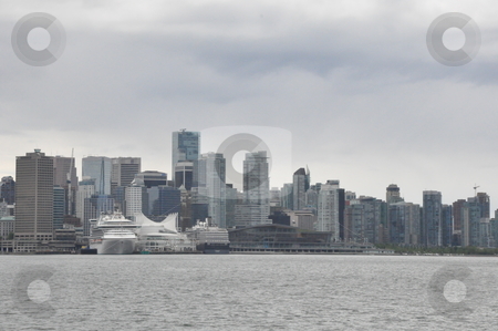To use this stock image in your creative project, please select the size you need over to the right and click the "Add to Cart" button.
Your downloaded image will come with the Cutcaster watermark removed so don’t worry about the watermark you see on this page. Vancouver Skyline stock photo, Vancouver Skyline in Canada by Ritu Jethani