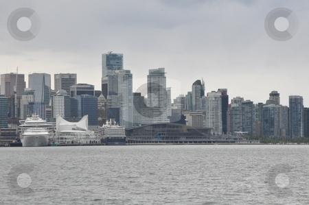 To use this stock image in your creative project, please select the size you need over to the right and click the "Add to Cart" button.
Your downloaded image will come with the Cutcaster watermark removed so don’t worry about the watermark you see on this page. Vancouver Skyline stock photo, Vancouver Skyline in Canada by Ritu Jethani