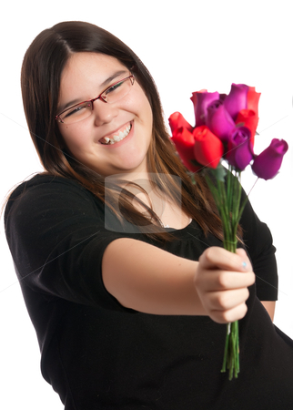 To use this stock image in your creative project, please select the size you need over to the right and click the "Add to Cart" button.
Your downloaded image will come with the Cutcaster watermark removed so don’t worry about the watermark you see on this page. Gift of Roses stock photo, A young girl is either giving or receiving a small bouquet of roses, isolated against a white background. by Richard Nelson