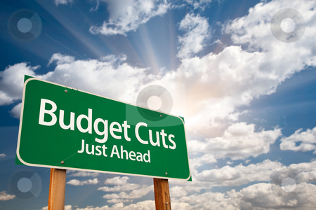 To use this stock image in your creative project, please select the size you need over to the right and click the "Add to Cart" button.
Your downloaded image will come with the Cutcaster watermark removed so don’t worry about the watermark you see on this page. Budget Cuts Green Road Sign and Clouds stock photo, Budget Cuts Green Road Sign with Dramatic Clouds, Sun Rays and Sky. by Andy Dean