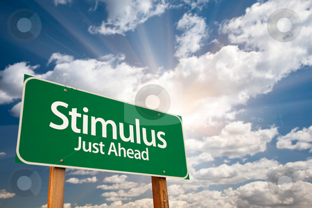 To use this stock image in your creative project, please select the size you need over to the right and click the "Add to Cart" button.
Your downloaded image will come with the Cutcaster watermark removed so don’t worry about the watermark you see on this page. Stimulus Green Road Sign and Clouds stock photo, Stimulus Green Road Sign with Dramatic Clouds, Sun Rays and Sky. by Andy Dean