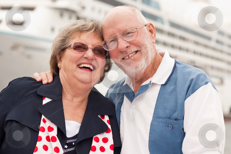 To use this stock image in your creative project, please select the size you need over to the right and click the "Add to Cart" button.
Your downloaded image will come with the Cutcaster watermark removed so don’t worry about the watermark you see on this page. Senior Couple On Shore in Front of Cruise Ship stock photo, Senior Couple On Shore in Front of Cruise Ship While on Vacation. by Andy Dean