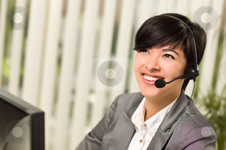 To use this stock image in your creative project, please select the size you need over to the right and click the "Add to Cart" button.
Your downloaded image will come with the Cutcaster watermark removed so don’t worry about the watermark you see on this page. Attractive Young Woman Smiles Wearing Headset stock photo, Attractive Young Woman Smiles Wearing Headset Near Her Computer Monitor. by Andy Dean