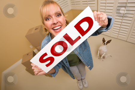 To use this stock image in your creative project, please select the size you need over to the right and click the "Add to Cart" button.
Your downloaded image will come with the Cutcaster watermark removed so don’t worry about the watermark you see on this page. Woman and Doggy with Sold Sign Near Moving Boxes stock photo, Excited Woman and Doggy with Sold Real Estate Sign Near Moving Boxes in Empty Room Taken with Extreme Wide Angle Lens.
by Andy Dean