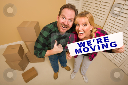 To use this stock image in your creative project, please select the size you need over to the right and click the "Add to Cart" button.
Your downloaded image will come with the Cutcaster watermark removed so don’t worry about the watermark you see on this page. Goofy Couple Holding We're Moving Sign Surrounded by Boxes stock photo, Goofy Thumbs Up Couple Holding We're Moving Sign in Room with Packed Cardboard Boxes. by Andy Dean