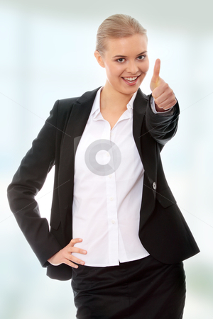 To use this stock image in your creative project, please select the size you need over to the right and click the "Add to Cart" button.
Your downloaded image will come with the Cutcaster watermark removed so don’t worry about the watermark you see on this page. Young business woman showing OK sign stock photo, Young business woman showing OK sign, looking at camera and smiling. by Piotr_Marcinski