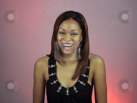 To use this stock image in your creative project, please select the size you need over to the right and click the "Add to Cart" button.
Your downloaded image will come with the Cutcaster watermark removed so don’t worry about the watermark you see on this page. Beautiful Teen Girl Laughing stock photo, A lovely teenage girl laughing. by Carl Stewart