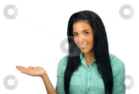 To use this stock image in your creative project, please select the size you need over to the right and click the "Add to Cart" button.
Your downloaded image will come with the Cutcaster watermark removed so don’t worry about the watermark you see on this page. Beautiful Teen Latina (1) stock photo, Close-up of a lovely teenage Latina with a bright, warm smile and long, luscious black hair, holding her hand out flat, palm up, allowing you to place whatever you wish in it or have her pointing to an item on your page or web site. by Carl Stewart