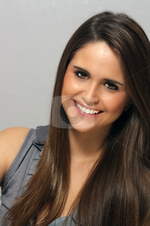 To use this stock image in your creative project, please select the size you need over to the right and click the "Add to Cart" button.
Your downloaded image will come with the Cutcaster watermark removed so don’t worry about the watermark you see on this page. Beautiful Young Brunette, Headshot (1) stock photo, A studio close-up of a lovely young brunette with long, luscious hair and a captivating smile. by Carl Stewart