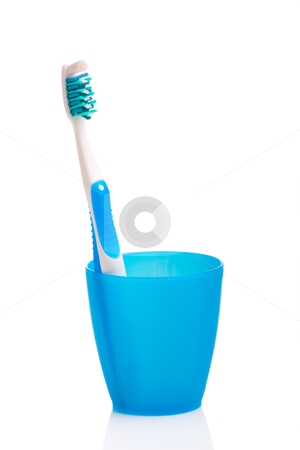 To use this stock image in your creative project, please select the size you need over to the right and click the "Add to Cart" button.
Your downloaded image will come with the Cutcaster watermark removed so don’t worry about the watermark you see on this page. Toothbrush stock photo, Hygiene objects, toothbrush on a cup isolated on white background by ikostudio