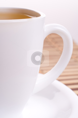 To use this stock image in your creative project, please select the size you need over to the right and click the "Add to Cart" button.
Your downloaded image will come with the Cutcaster watermark removed so don’t worry about the watermark you see on this page. White cup of tea stock photo, a white cup of tea standing on the table by Artem Zamula
