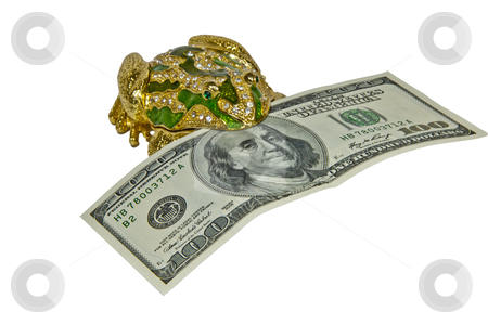 To use this stock image in your creative project, please select the size you need over to the right and click the "Add to Cart" button.
Your downloaded image will come with the Cutcaster watermark removed so don’t worry about the watermark you see on this page. Money in a frog stock photo, money in a frog $ 100 bill isolated on a white background by Shevket