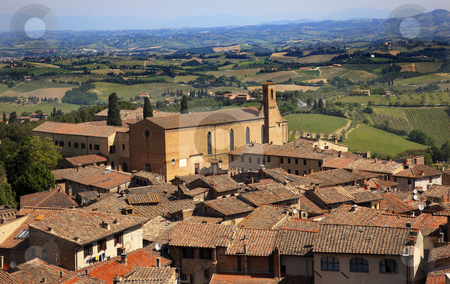 To use this stock image in your creative project, please select the size you need over to the right and click the "Add to Cart" button.
Your downloaded image will come with the Cutcaster watermark removed so don’t worry about the watermark you see on this page. Old Tuscan Town Church Red Brick Roofs San Gimignano Tuscany Ita stock photo, Old Tuscan Town Church Red Brick Roofs Countryside Vineyards San Gimignano Tuscany Italy by William Perry