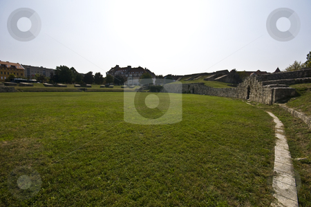 To use this stock image in your creative project, please select the size you need over to the right and click the "Add to Cart" button.
Your downloaded image will come with the Cutcaster watermark removed so don’t worry about the watermark you see on this page. Amphitheater stock photo, part of the old roman amphitheater in Budapest by Juliane Jacobs